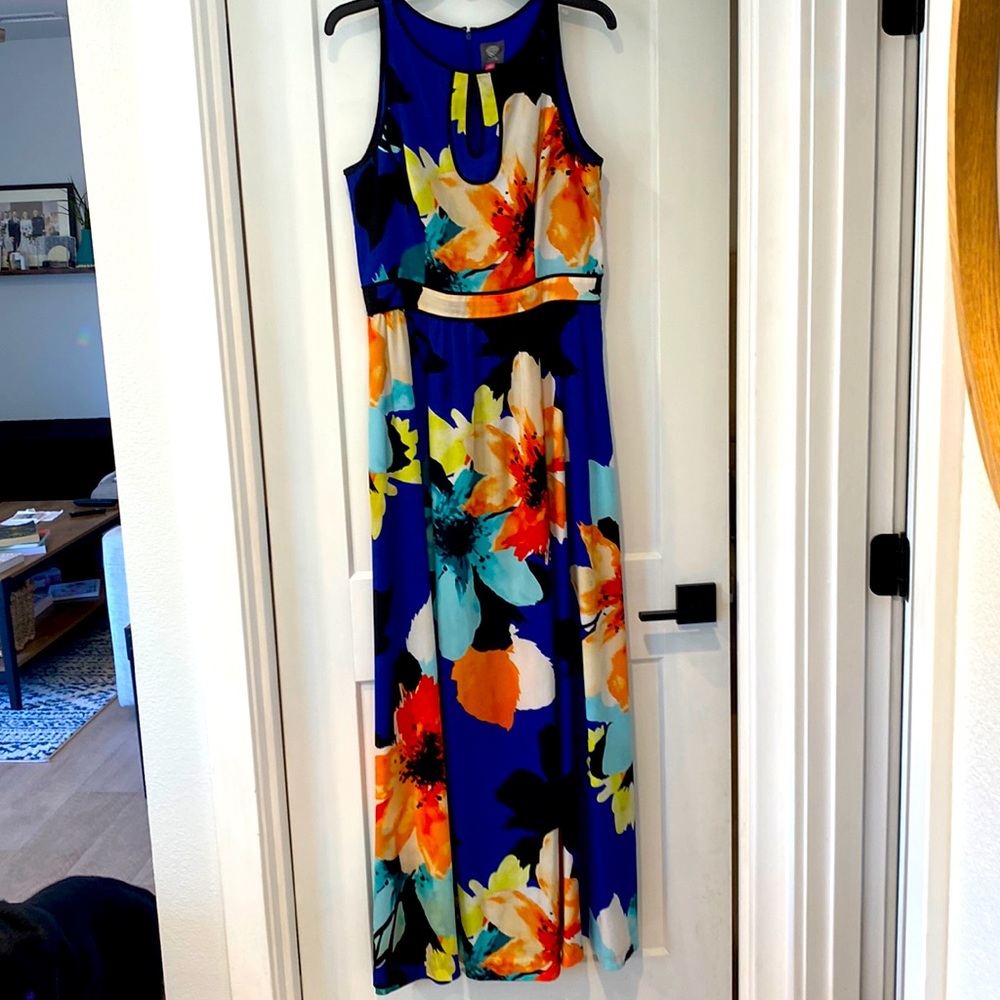 Beautiful royal blue with yellow, light blue and light orange flowers.
